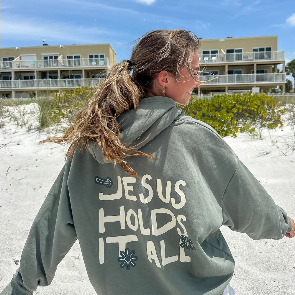 Elevated Faith Hoodie jesus holds it all